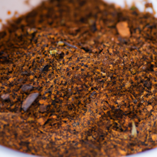 A close-up of a bowl of homemade Cajun seasoning mix